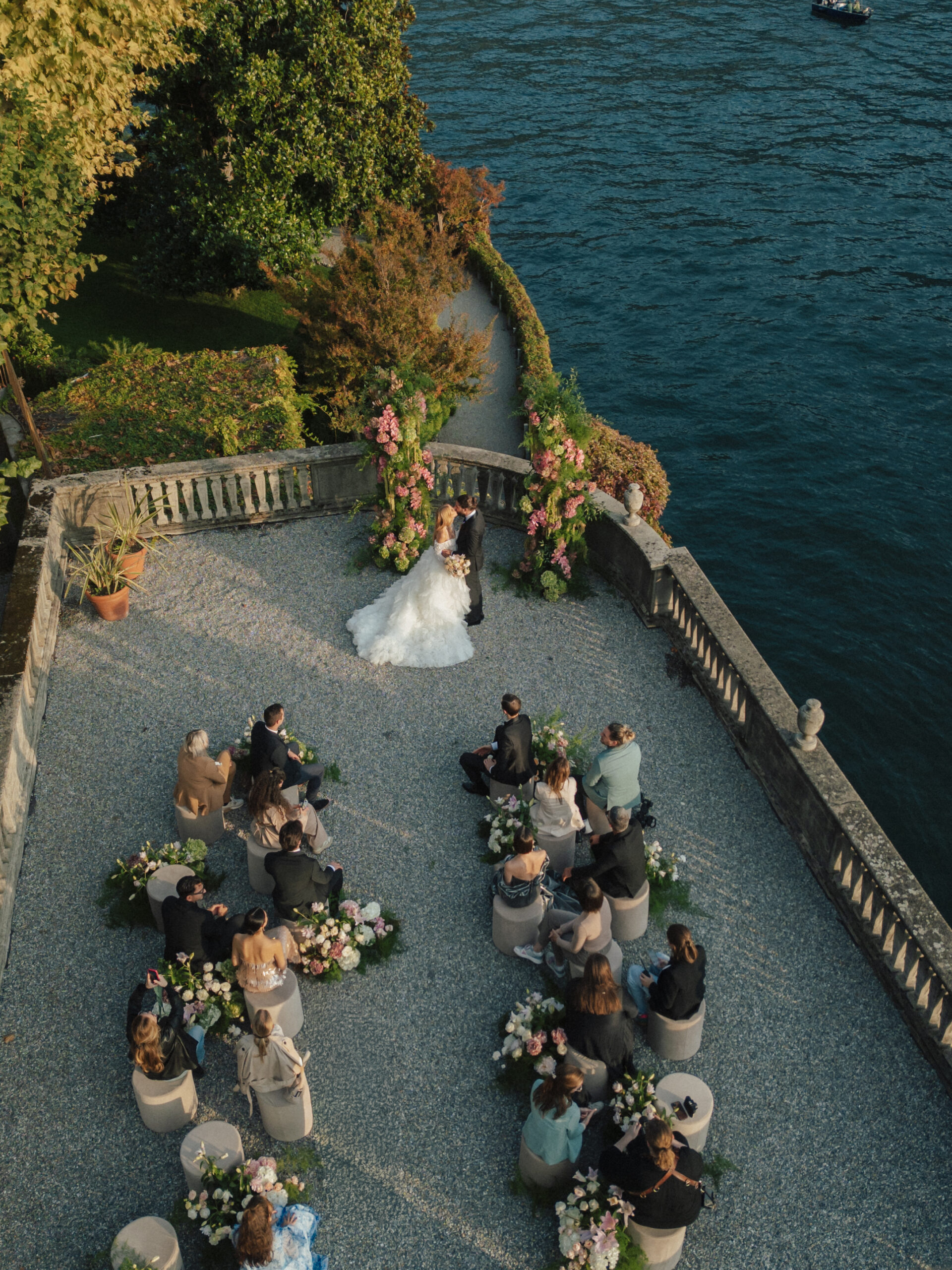 Outdoor wedding ceremony at Villa Pizzo, Lake Como — editorial destination wedding photography by Kaiser Studios