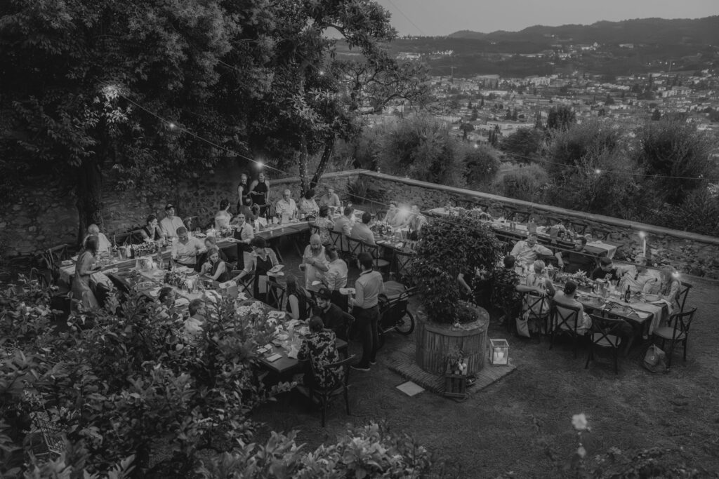 Garden wedding dinner under fairy lights at Villa Bissiniga, Salò