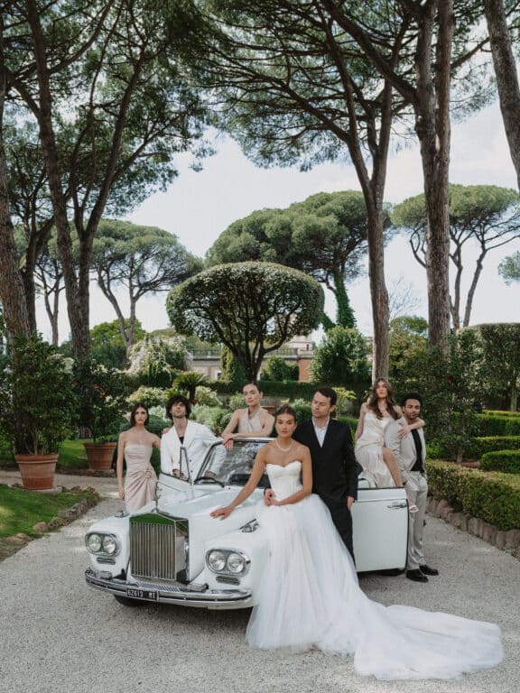 Editorial group photo with classic car at Villa Aurelia